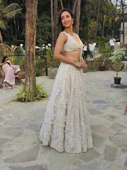 I styled Tripti Dimri in this breathtaking all-white embroidered lehenga by Seema Gujral. The delicate craftsmanship and modern bralette-style blouse make it a perfect example of contemporary Indian couture.