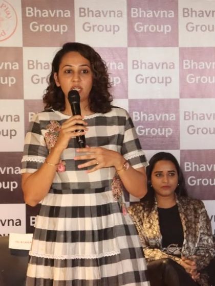 A close up of me speaking at the Bhavna Group event. Sharing my personal journey and entrepreneurial story is a powerful way to connect with and inspire other professional women.