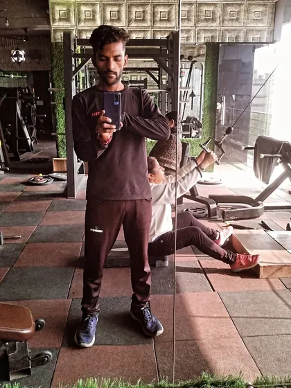 A mirror selfie at the gym. A simple moment of reflection during a workout.