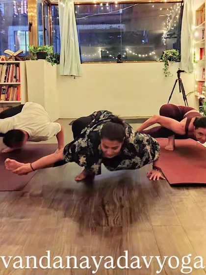 The baby grasshopper pose is a fun arm balance that also provides a great twist and hip opener. My students are all at different stages of mastering it.