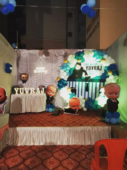 A Boss Baby theme stage setup for an outdoor or society compound event, showing the versatility of the theme for different spaces.