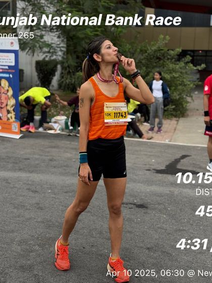 Kissing the medal after a strong 10km race. This moment is the culmination of weeks of hard work, early mornings, and disciplined training.
