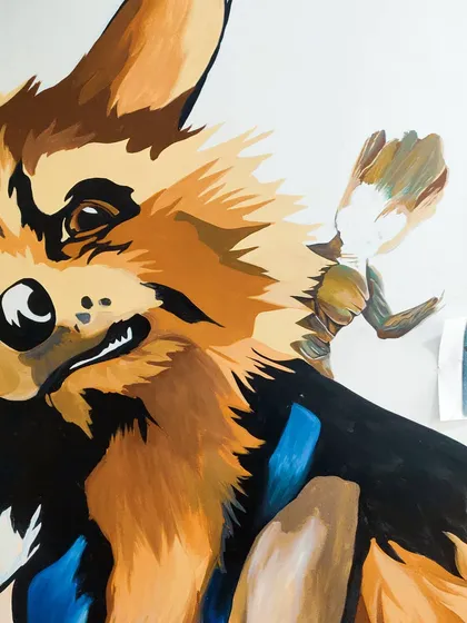 Here's a peek at the Rocket and Groot mural midway through. We start with base colors and then add details and shading.