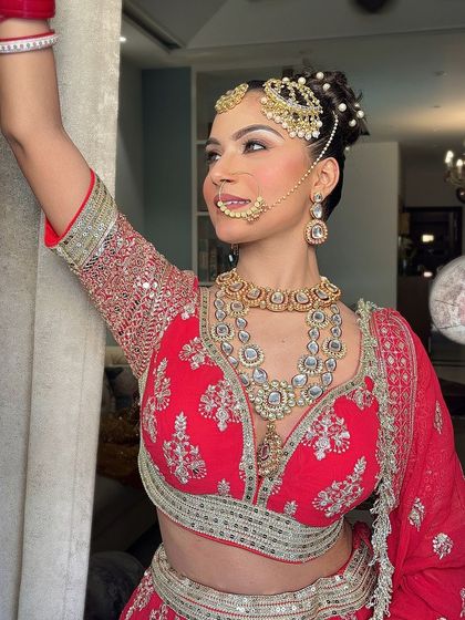 An extensive series of our classic red bridal lehenga. These images capture every detail, from the embroidery to the full bridal styling, providing a complete reference.