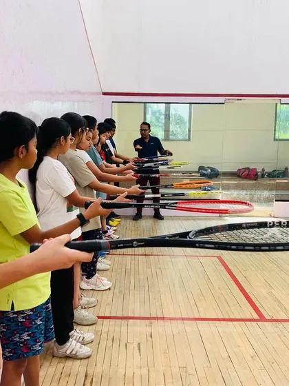 Discipline is the foundation of a great player. In this drill, students practice holding their racket position, building muscle memory and focus that translates directly into their performance during a match.