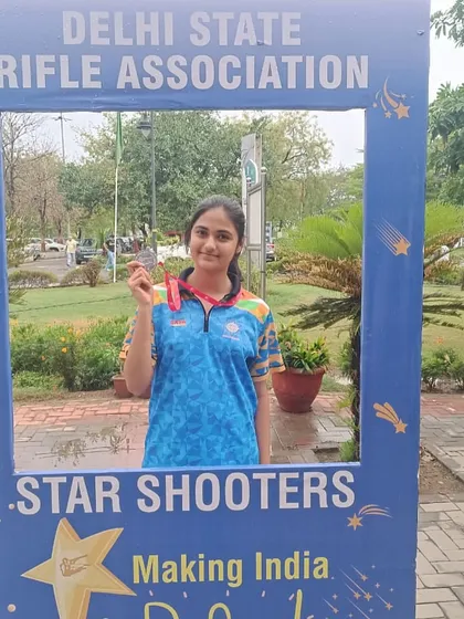 A silver medalist from the Delhi State Interschool Championship posing in the "Star Shooters" frame. We are truly making India proud, one shooter at a time.