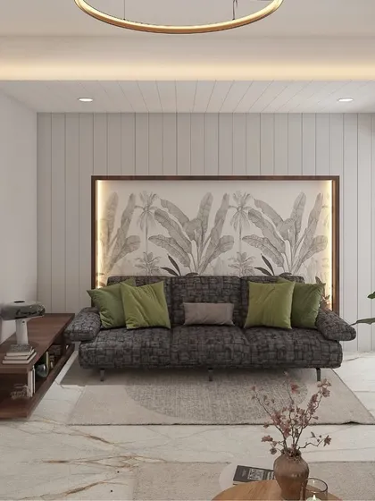 An alternate view showing how a feature wall with a subtle, large-scale botanical print can add depth and interest without overwhelming the space. The green accent pillows tie the whole look together.