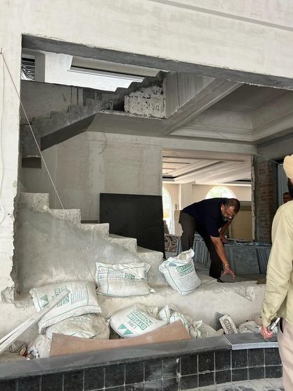 Buildings are not built from blueprints alone. This on-site image shows the raw, transformative phase of construction, where structural changes are made and the new vision for the space begins to take physical form.