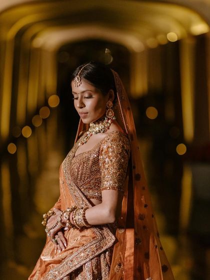 A moody and romantic portrait, with the background lights creating a beautiful bokeh effect.