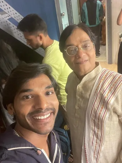A quick selfie with Bijjug Kalaa sir during the shoot. Building a good rapport with the artists I'm choreographing is key to a successful collaboration.