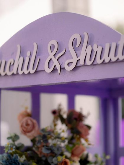 A close-up of the custom signage for Ruchil & Shruti's carnival-themed event.