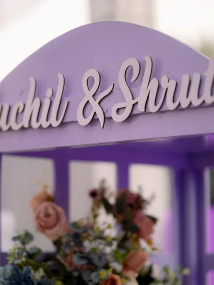 A close-up of the custom signage for Ruchil & Shruti's carnival-themed event.