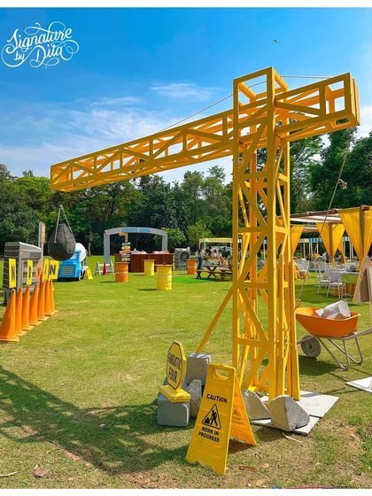 A giant yellow crane prop was a major highlight of the construction party. These large-scale, custom pieces are what make my themed events so memorable.