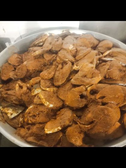 Marinated fish steaks, seasoned and ready to be cooked. This is a great starter option for seafood lovers.