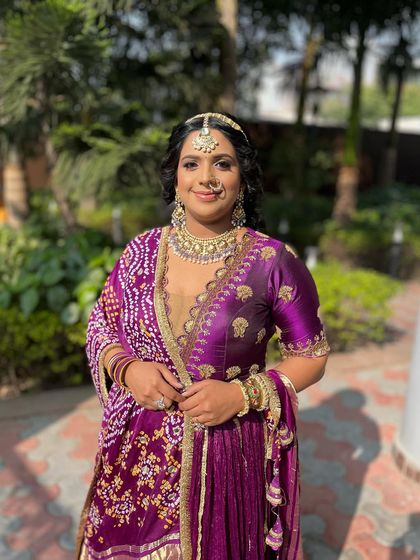 Violet vibes for this party guest. We used a hint of purple kajal to tie in with her beautiful bandhani lehenga, creating a dewy and cohesive look.
