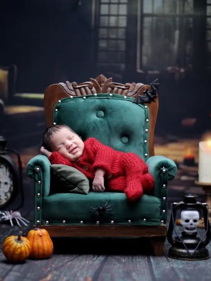 The full Halloween scene, showcasing the detailed backdrop and variety of props we use to set a perfectly spooky mood for the photoshoot.