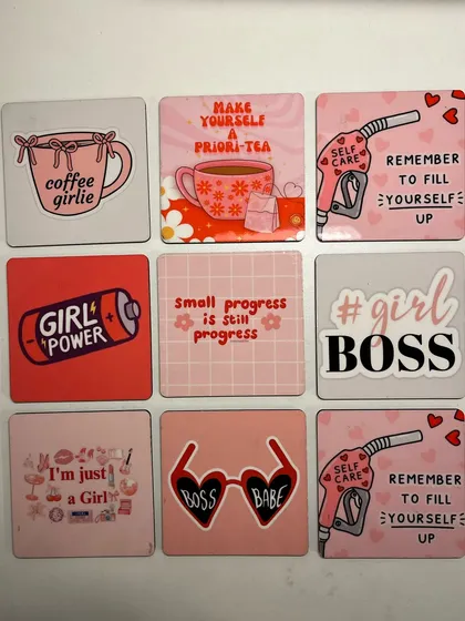 A collection of quirky and empowering coasters with phrases like "#GIRLBOSS" and "Small progress is still progress," which were part of our Women's Day hampers.