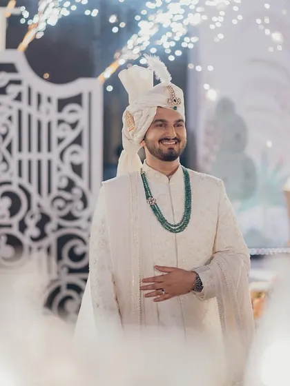A close up of the groom's happy expression during his entry. Our goal is to make these moments feel as joyful and stress-free as they are grand.