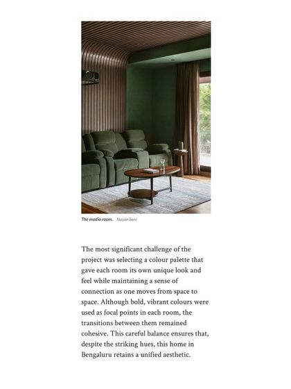 The moody green media room from 'Tinted Tapestries' featured in Architectural Digest.