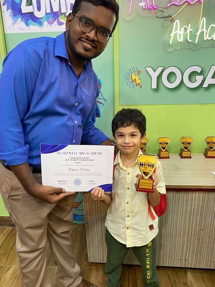 Rihaan Dubey, another one of our chess enthusiasts, being awarded for his participation in the academy tournament.