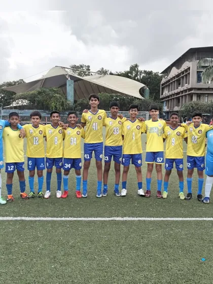 Our former trainees, now representing top clubs, stand together. This photo shows the strong foundation and friendships built at our academy.