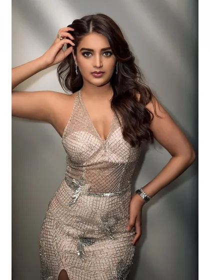 A glamour portrait of actress Nidhhi Agerwal, showcasing a sophisticated and polished look for an event. My process involves careful lighting and retouching to create magazine-quality images that highlight the subject's personality.
