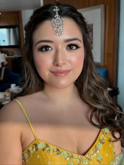A beautiful close-up of the bride, her simple hairstyle allowing her natural beauty to shine.