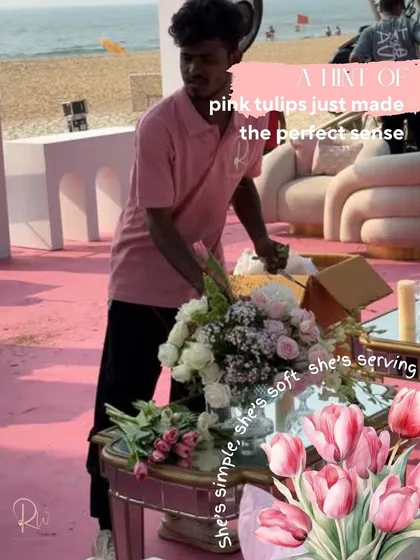 A behind-the-scenes shot of my team member arranging a bouquet with pink tulips for the Goa beach wedding. It's these simple, soft touches that make a difference.