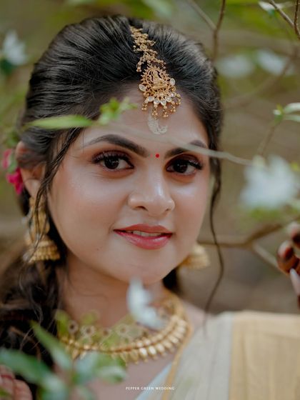 Another stunning close-up of the bride, her expressive eyes and gentle smile perfectly captured.