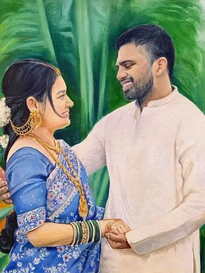 This custom couple portrait was commissioned for a client in Port Blair. I used a lush, green background to complement the bride's beautiful blue saree.