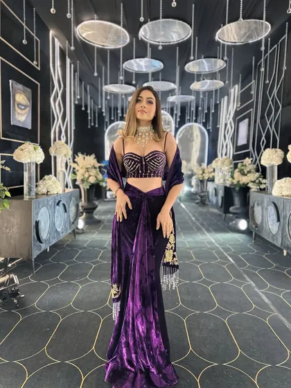 The Art Deco-inspired walkway for a sangeet, designed to make a statement. The interplay of light, mirrors, and geometric patterns creates a perfect backdrop for photos while setting a luxurious tone.