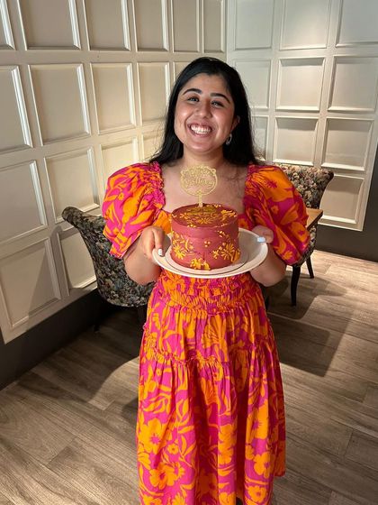 The happiest picture on my feed! A beautiful client celebrating her 25th birthday with the custom cake I made to match her vibrant dress.