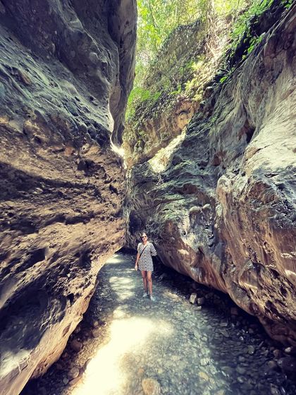 You never know what you'll find when you explore. I discovered this incredible natural cave right in the middle of a small town, a perfect example of the hidden wonders that travel reveals.