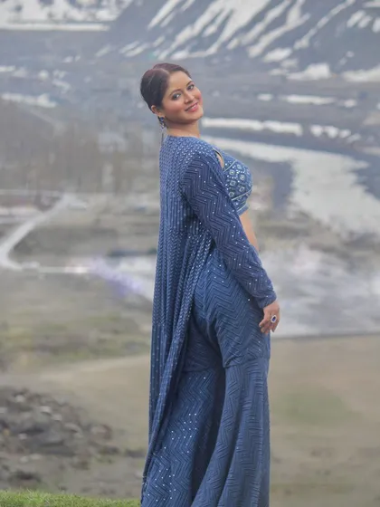 The back view of the co-ord set, highlighting the long jacket and flowing pants.