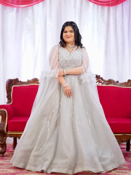 A poised and elegant portrait for her anniversary celebration. The entire look is timeless and sophisticated.