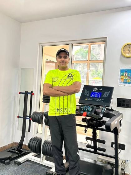 Another photo in my bright workout gear, ready to motivate.