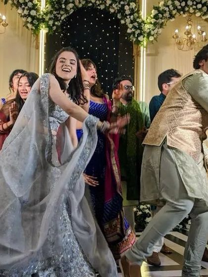 The coolest bride dancing with her cousins. These group dances create some of the most fun and lasting memories from the wedding.