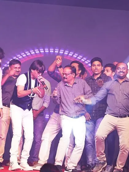 The audience joining me on stage for a dance. This is what a successful corporate party looks like.