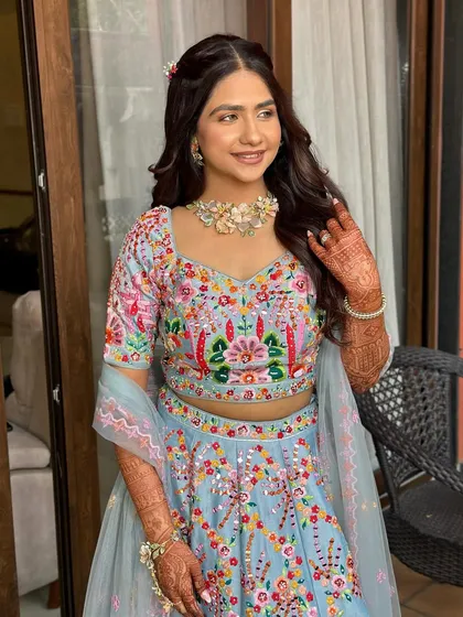 A radiant smile from my bride. Her makeup is minimal and fresh, perfect for her daytime event and colorful pastel outfit.