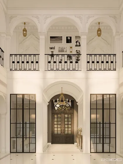 The multi-level lobby is defined by its classical arches and wrought-iron balustrades. This view showcases the intricate layers of the design, where balconies overlook the main entrance, creating a dynamic and interactive space.