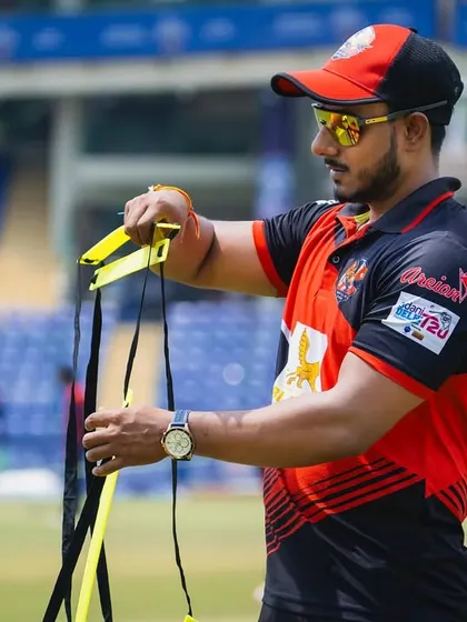 Preparing the equipment for a training session. As a coach, every detail matters in creating a professional and effective training environment.