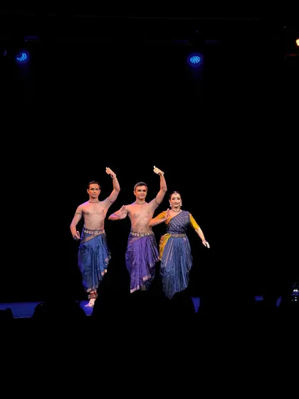 A wide shot of the 'Abha' performance in Europe. Performing on international stages allows us to share our art with diverse audiences.