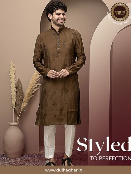 Styled to perfection, this earthy brown kurta is ideal for a Mehndi or Haldi ceremony. The subtle embroidery on the placket and collar adds a touch of elegance to the rich, solid color.