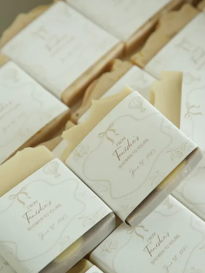 The custom-wrapped soaps, designed to match the baby shower invitation.