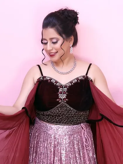 The full look in all its glory. The makeup, hair, and outfit come together to create a show-stopping ensemble for any celebration.