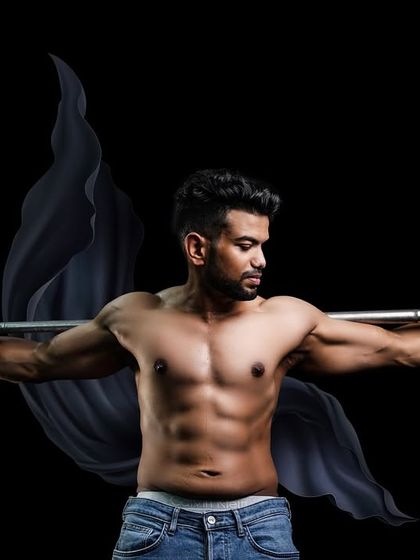 This wide-angle shot uses a barbell held across the shoulders to create a powerful, heroic pose. The added fabric element introduces a sense of motion and drama to the composition.