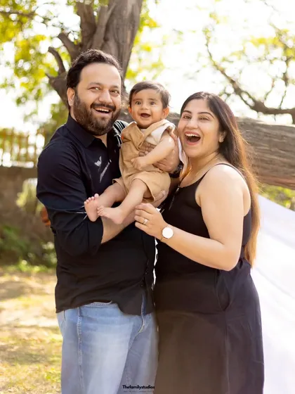 Pure, infectious laughter from a family of three during their outdoor session. Our goal is to create an environment where you can relax and let your true joy shine through.