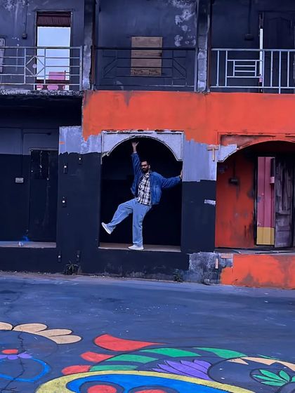A dynamic pose that interacts with the urban architecture. This demonstrates how I can use the environment to create a compelling image for a fashion or lifestyle shoot.
