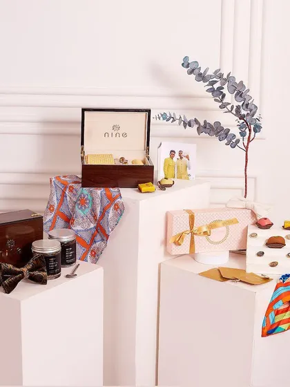 We love to collaborate with other artisans. This shows one of our exclusive gift hampers, which combines our stylish men's accessories with gourmet sweets, creating a unique offering for festive or corporate gifting.