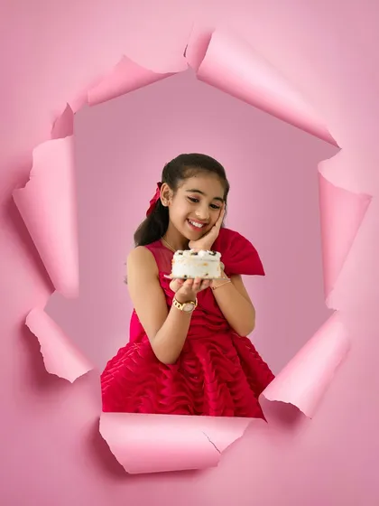 A creative and fun birthday portrait for an older child. This unique paper-tear effect adds a pop of color and personality, making her birthday photos truly one of a kind.
